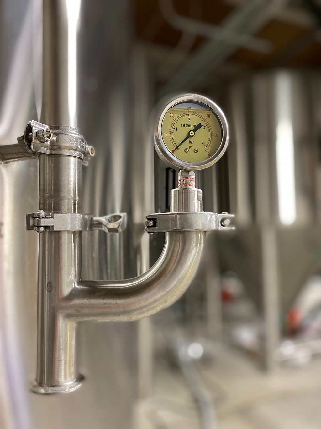 A skilled plumber installing a solar hot water system with precision.